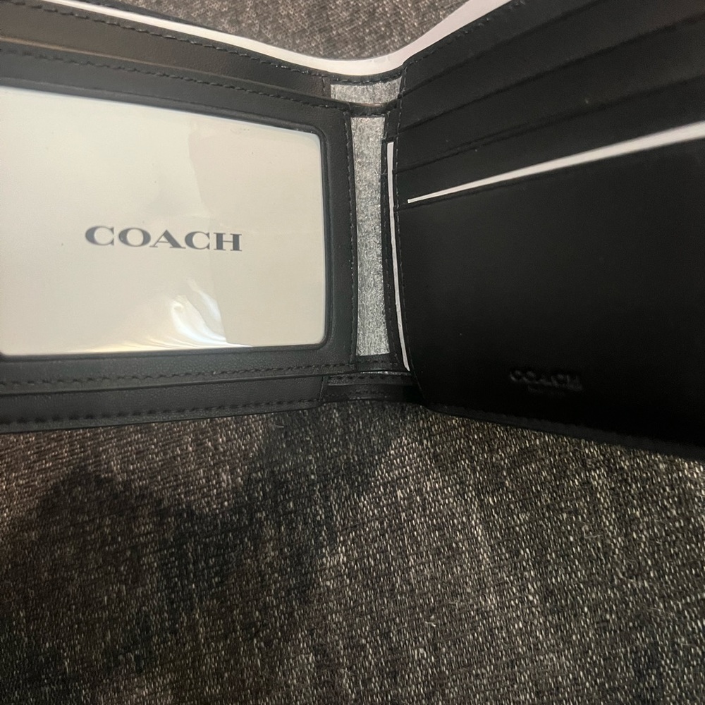 Black and Grey wallet it’s brand new